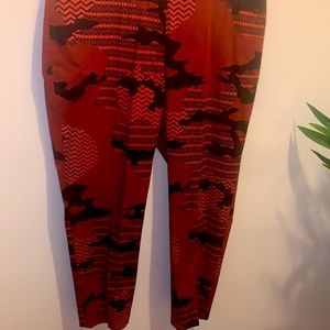 Rust colored and black ankle pants